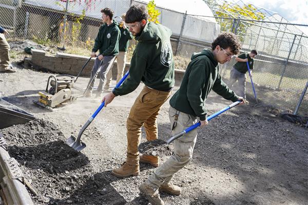 HORTICULTURE, LANDSCAPE & DESIGN students working in greenhouse